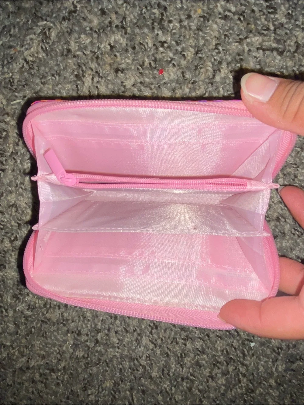 Pink heart embossed wristlet wallet